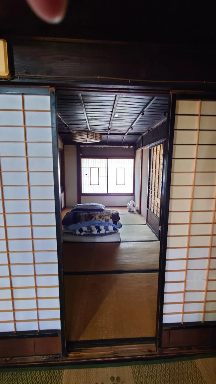 Kominka staircase through shoji
